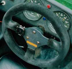 [Image: Sigma computer bracket on Seven steering wheel.]